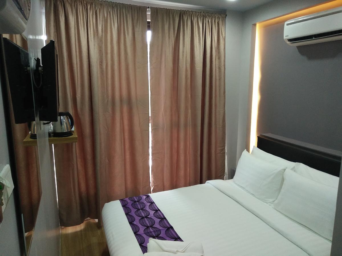 Sunset Villa Inn Pantai Cenang  Bagian luar foto